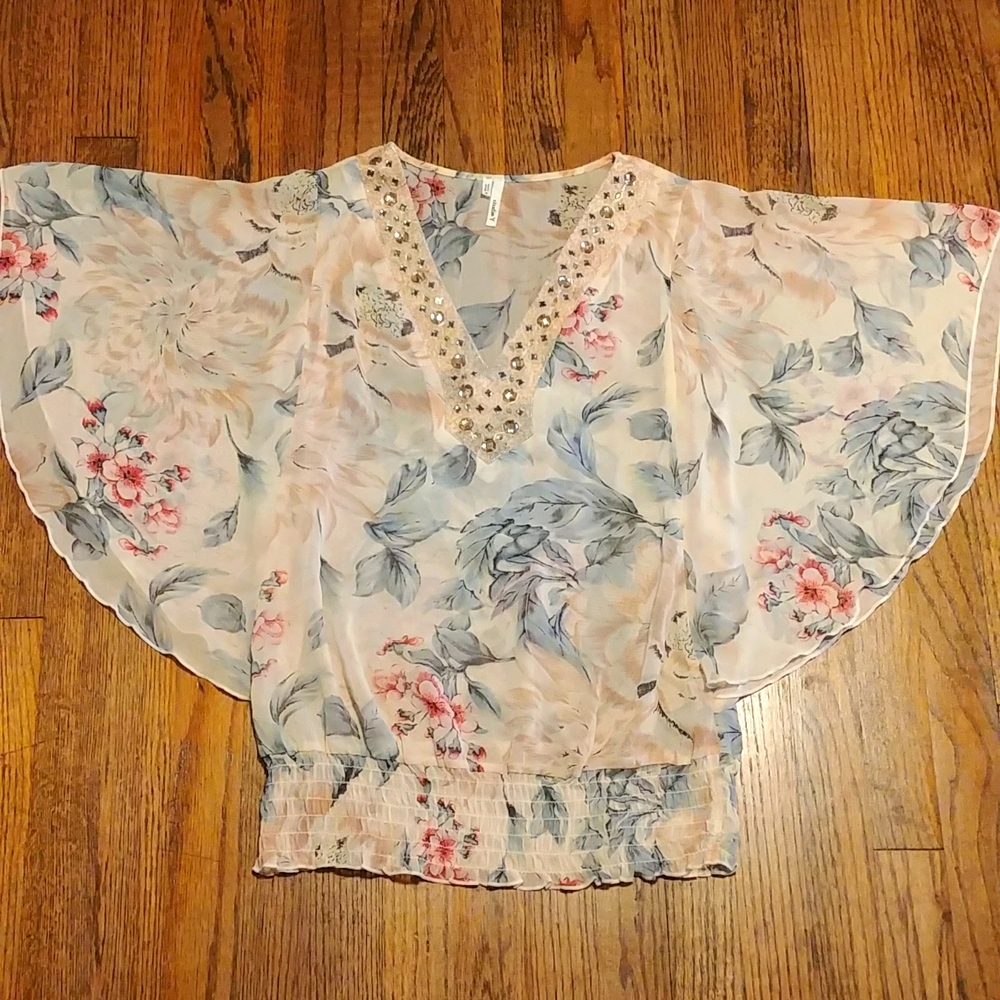 STUNNING SHEAR EMBELLISHED SHIRT.